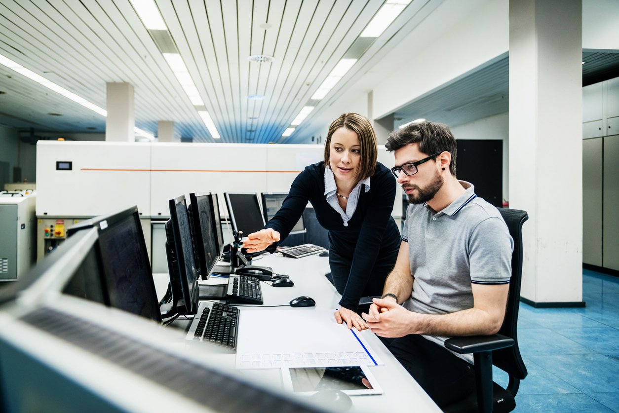 coworkers at computer